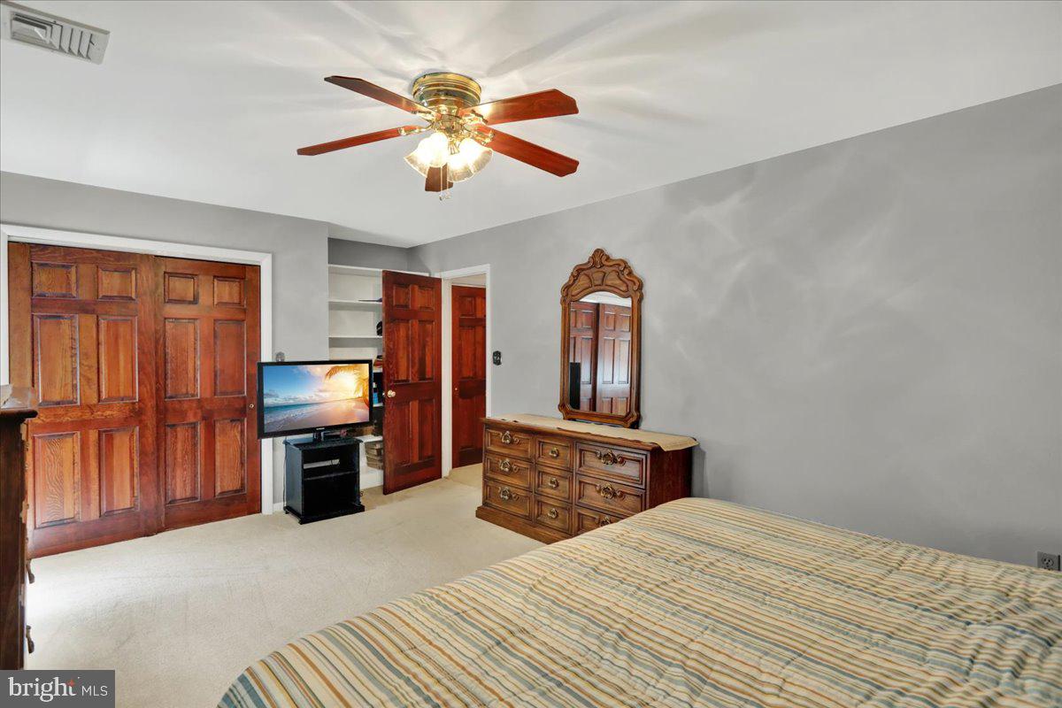 1649 Sherwood Road Reading, PA 19610 - Photo 13 of 37 a bedroom with a bed and a television