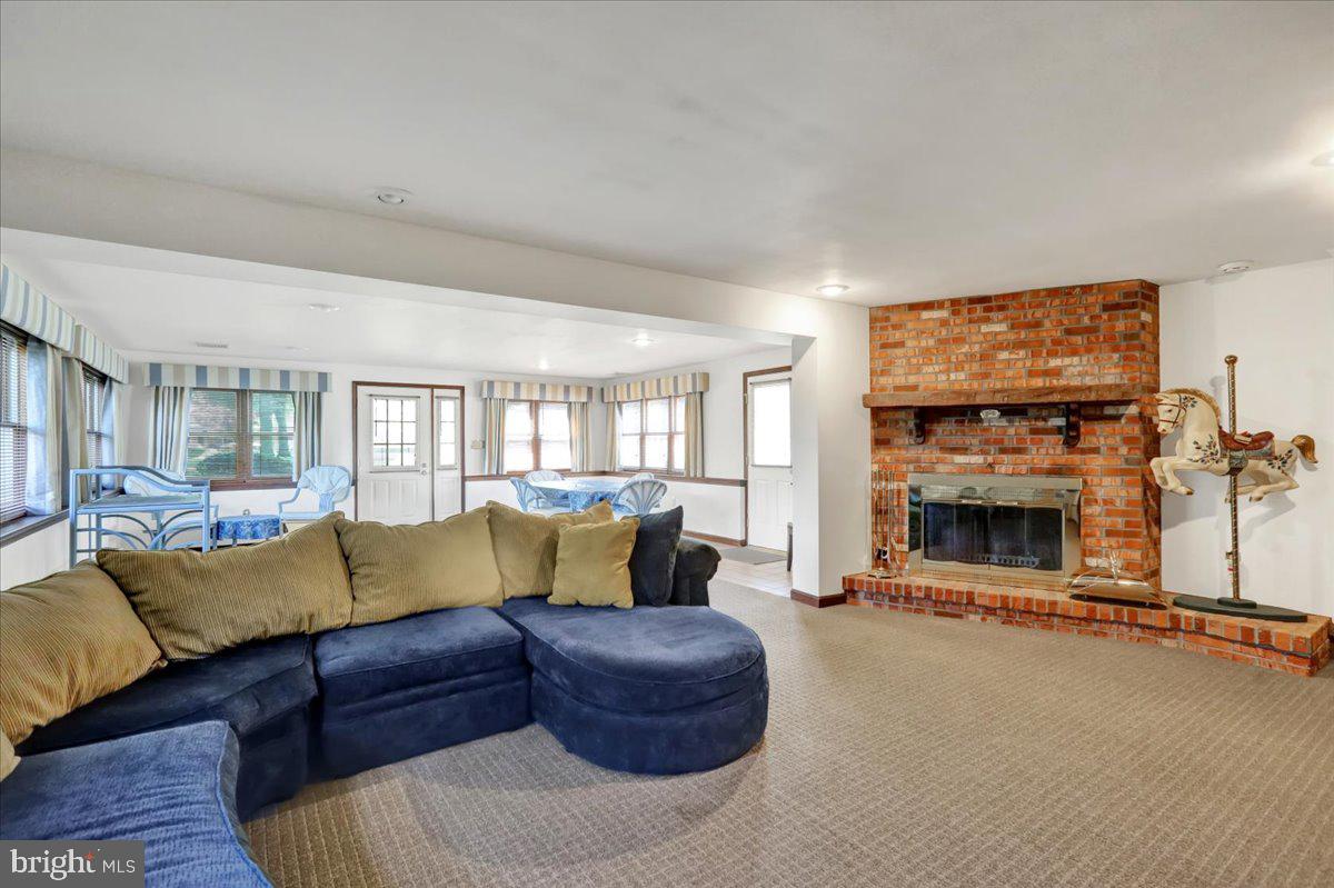 1649 Sherwood Road Reading, PA 19610 - Photo 20 of 37 a living room with furniture and a fireplace