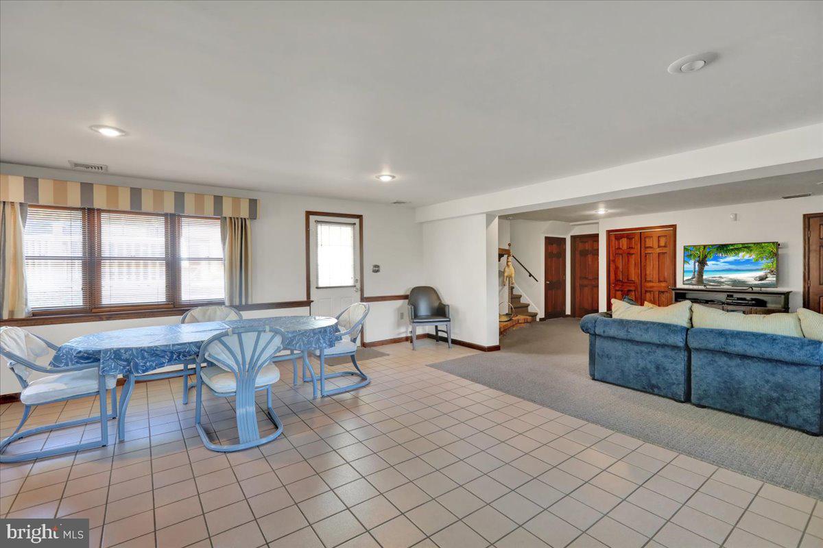 1649 Sherwood Road Reading, PA 19610 - Photo 24 of 37 a living room with furniture and a flat screen tv
