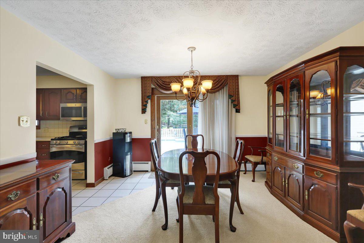 1649 Sherwood Road Reading, PA 19610 - Photo 5 of 37 a view of a dining room with furniture window and outside view