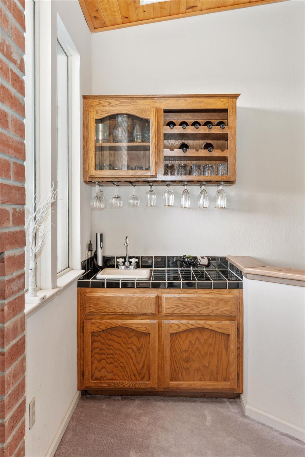 257 Snowberry Court Murphys, CA 95247 - Photo 13 of 56 a view of kitchen with stainless steel appliances granite countertop a stove and a microwave