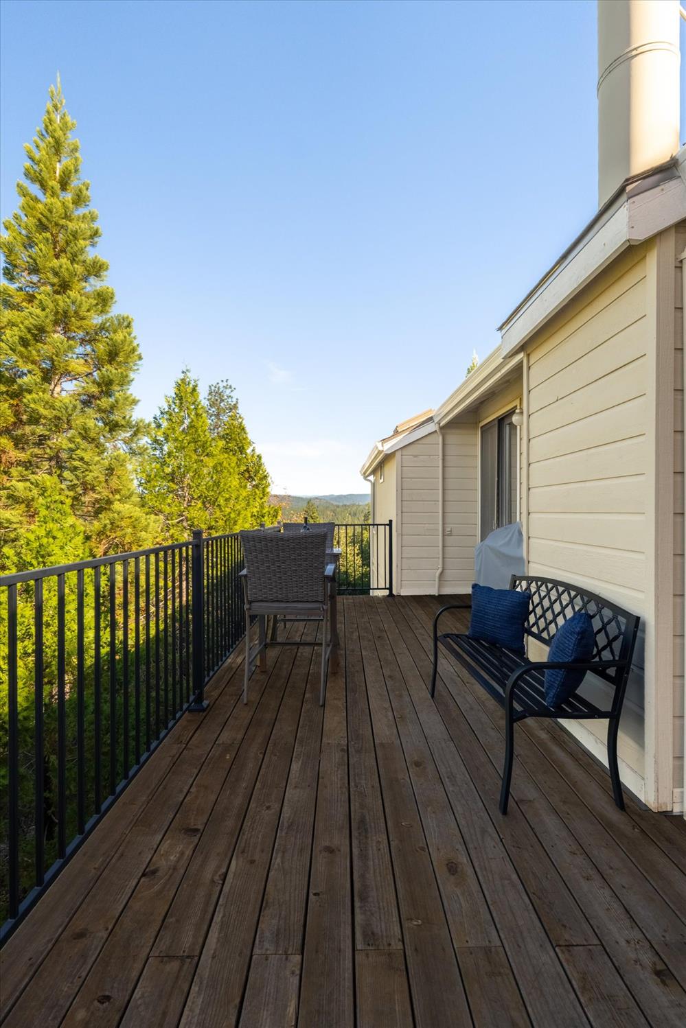 257 Snowberry Court Murphys, CA 95247 - Photo 20 of 56 a view of a roof deck with wooden floor and fence