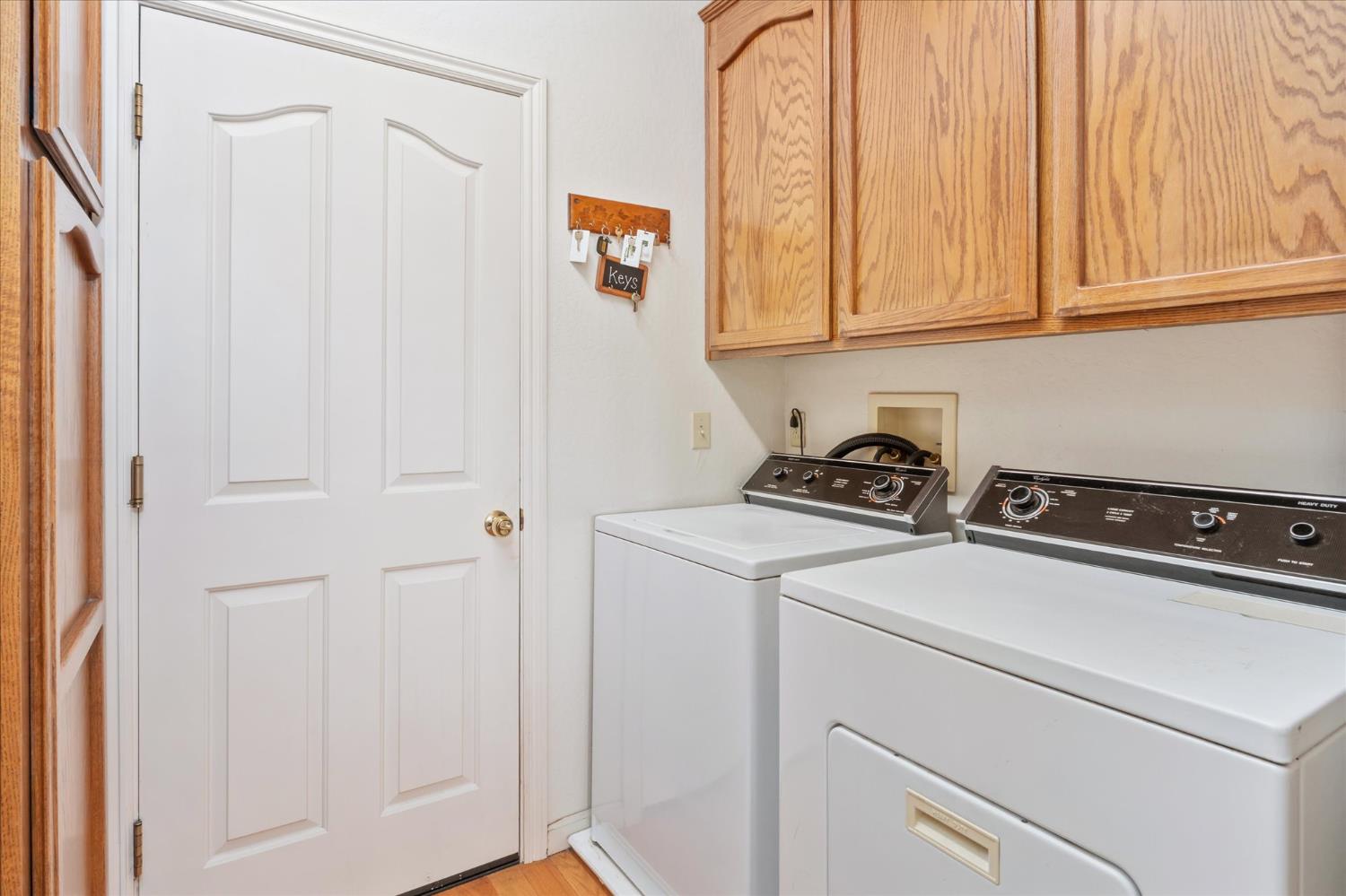 257 Snowberry Court Murphys, CA 95247 - Photo 31 of 56 a utility room with dryer and washer