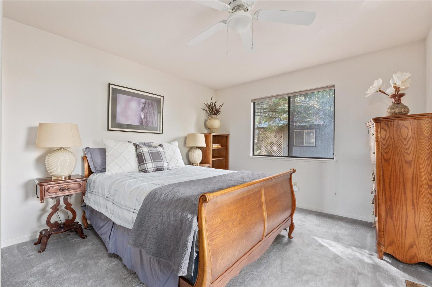 257 Snowberry Court Murphys, CA 95247 - Photo 34 of 56 a bedroom with bed and window