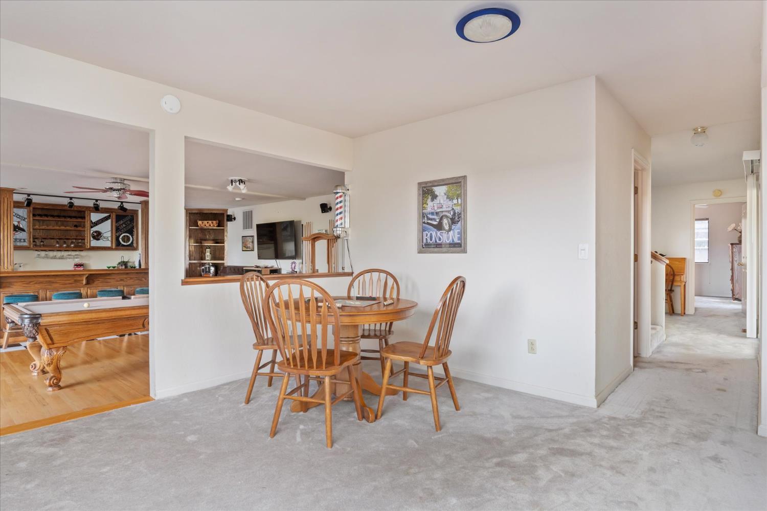 257 Snowberry Court Murphys, CA 95247 - Photo 36 of 56 a dining room with furniture and window