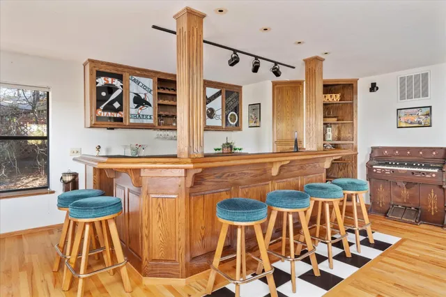 a kitchen with a stove and a refrigerator
