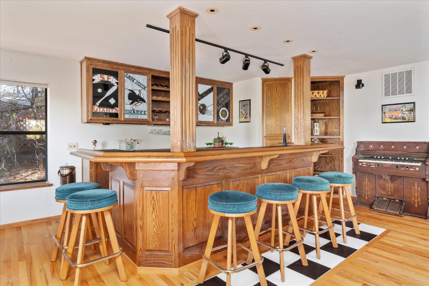 257 Snowberry Court Murphys, CA 95247 - Photo 39 of 56 a kitchen with stainless steel appliances kitchen island granite countertop a table and chairs