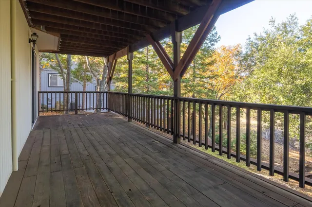 a view of swimming pool from a balcony