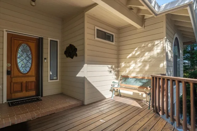 a view of entryway with wooden floor