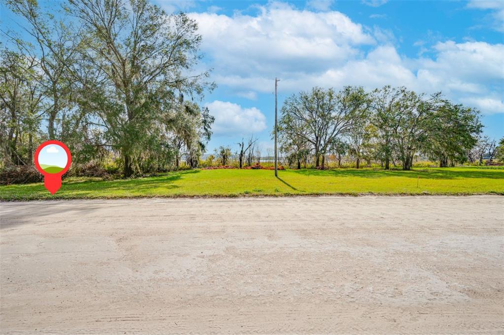 0 McKendree Road Wesley Chapel, FL 33545 - Photo 3 of 25 a view of a swimming pool with a yard