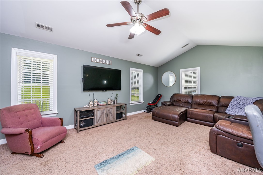 2118 Dorrell Road Aylett, VA 23009 - Photo 13 of 36 Living area featuring a ceiling fan, lofted ceilin