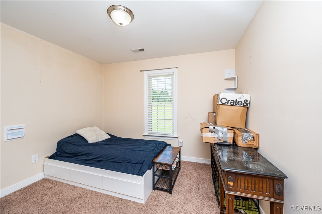 2118 Dorrell Road Aylett, VA 23009 - Photo 19 of 36 Carpeted bedroom featuring baseboards