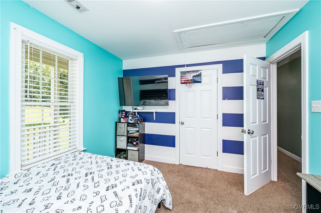 2118 Dorrell Road Aylett, VA 23009 - Photo 25 of 36 Carpeted bedroom with attic access and a closet