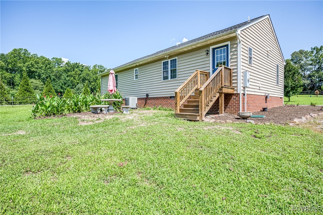 2118 Dorrell Road Aylett, VA 23009 - Photo 33 of 36 Rear view of house featuring crawl space