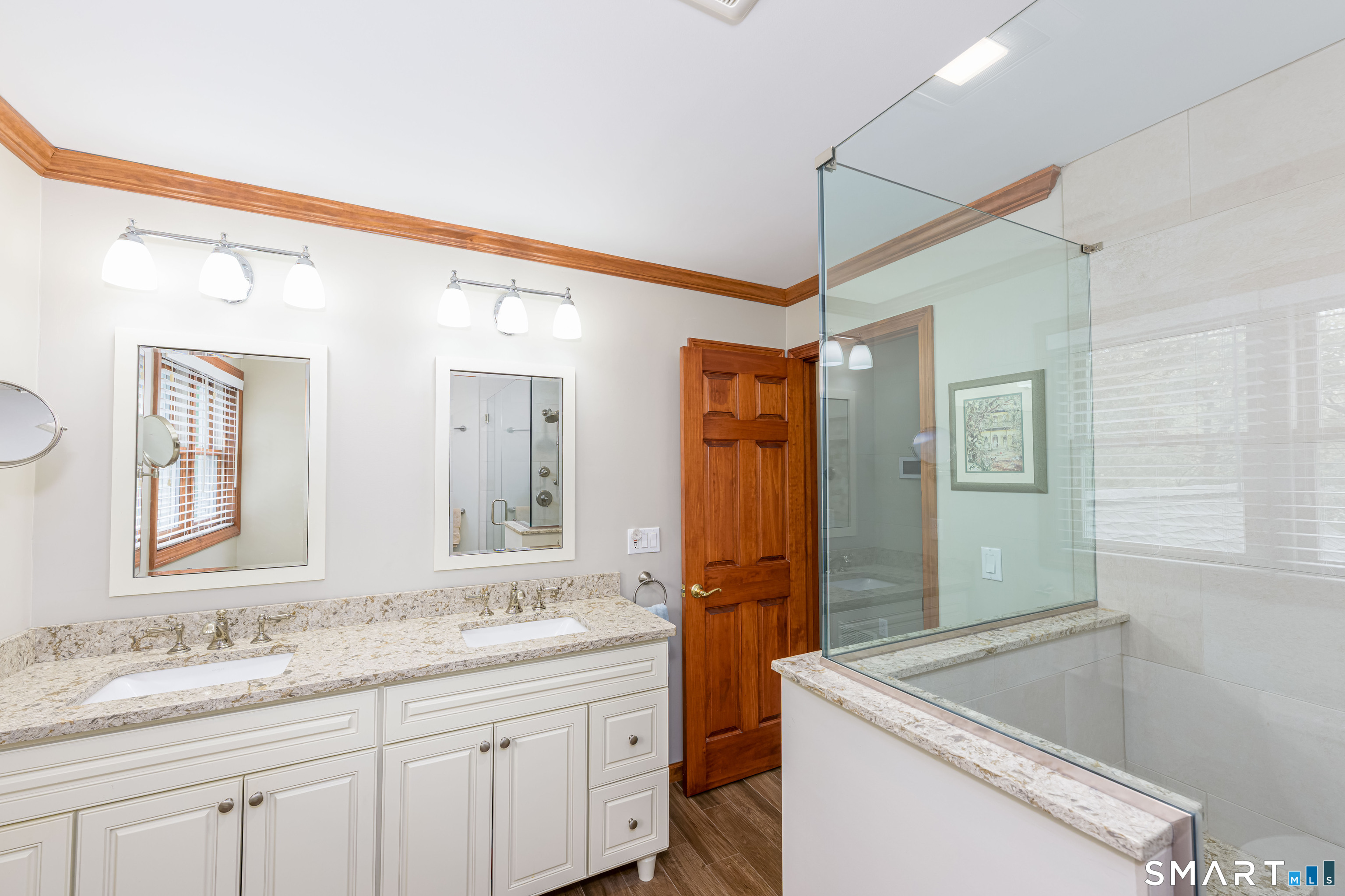 4 Crystal Lane Wallingford, CT 06492 - Photo 20 of 40 a bathroom with a granite countertop sink mirror and a