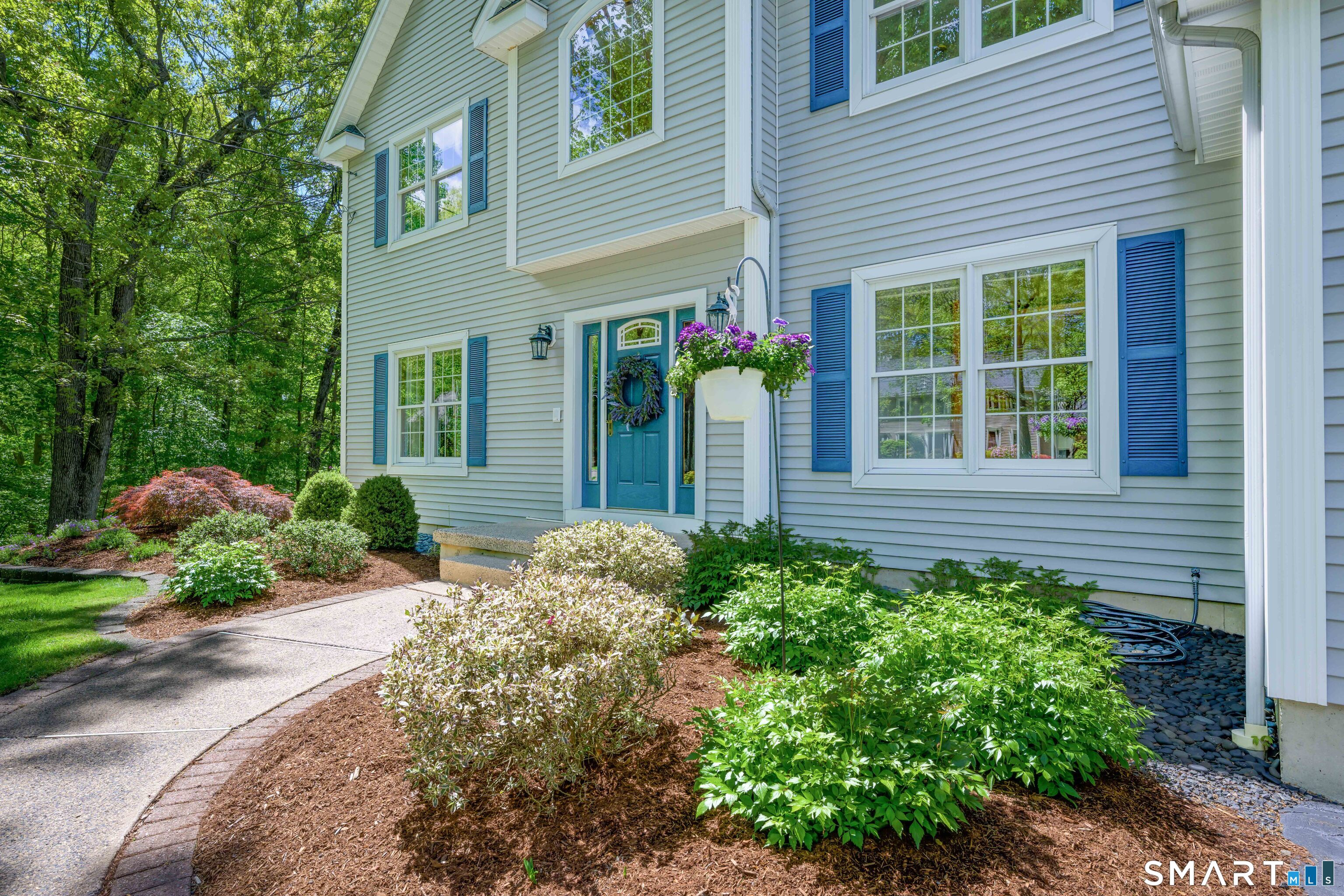4 Crystal Lane Wallingford, CT 06492 - Photo 2 of 40 a front view of a house with garden
