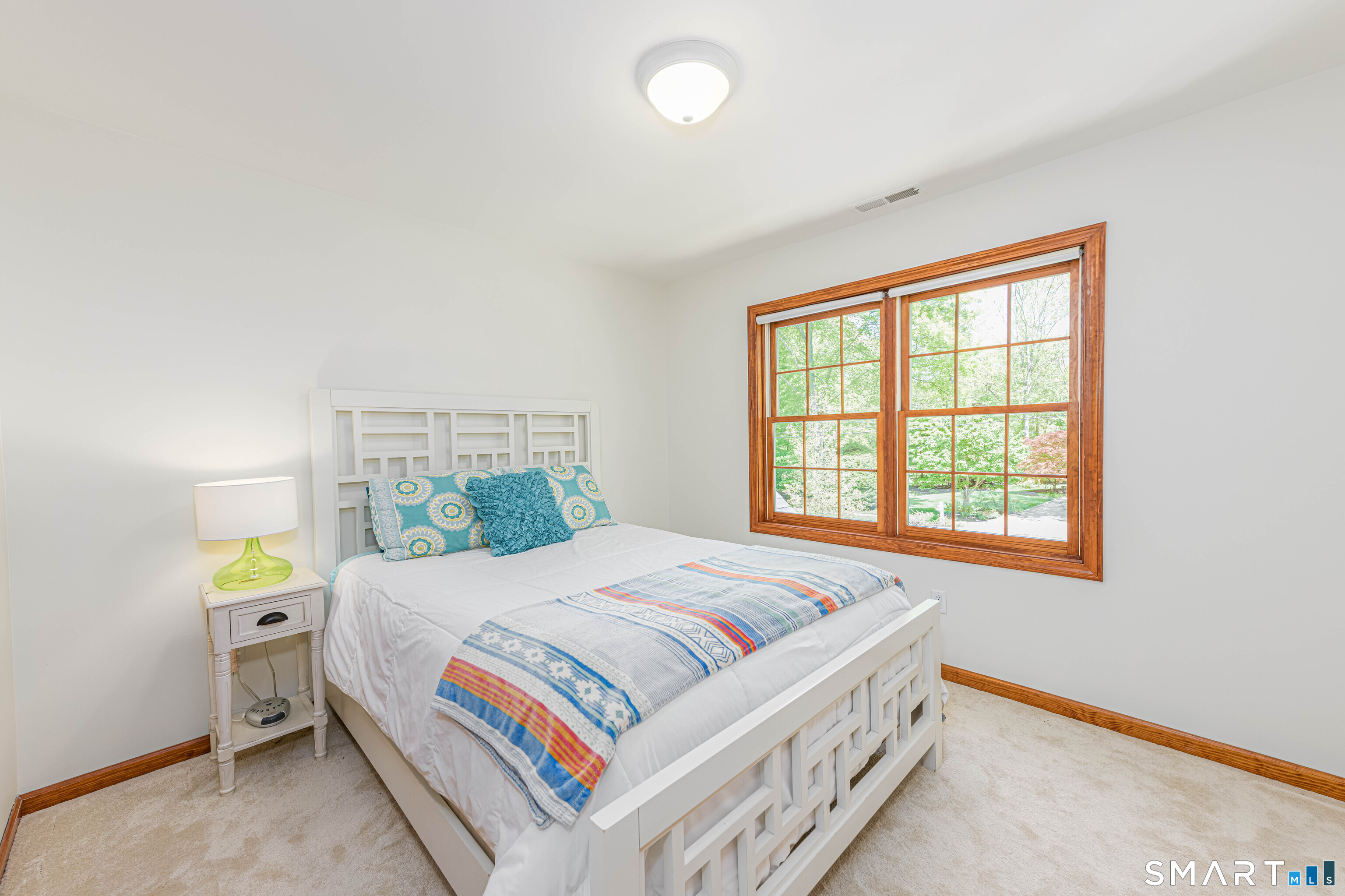 4 Crystal Lane Wallingford, CT 06492 - Photo 23 of 40 a bedroom with a bed and a window