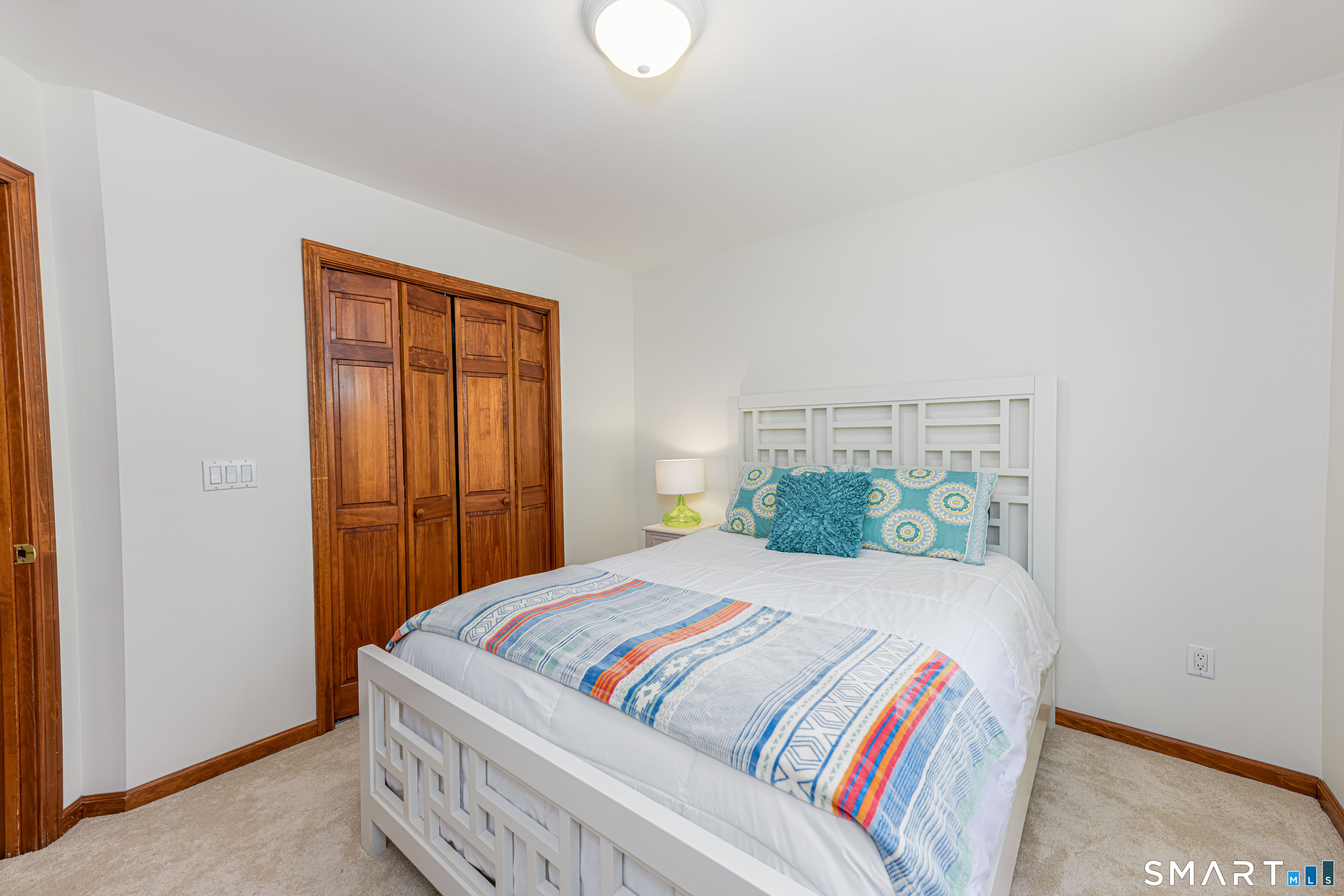 4 Crystal Lane Wallingford, CT 06492 - Photo 24 of 40 a bedroom with a bed and a window