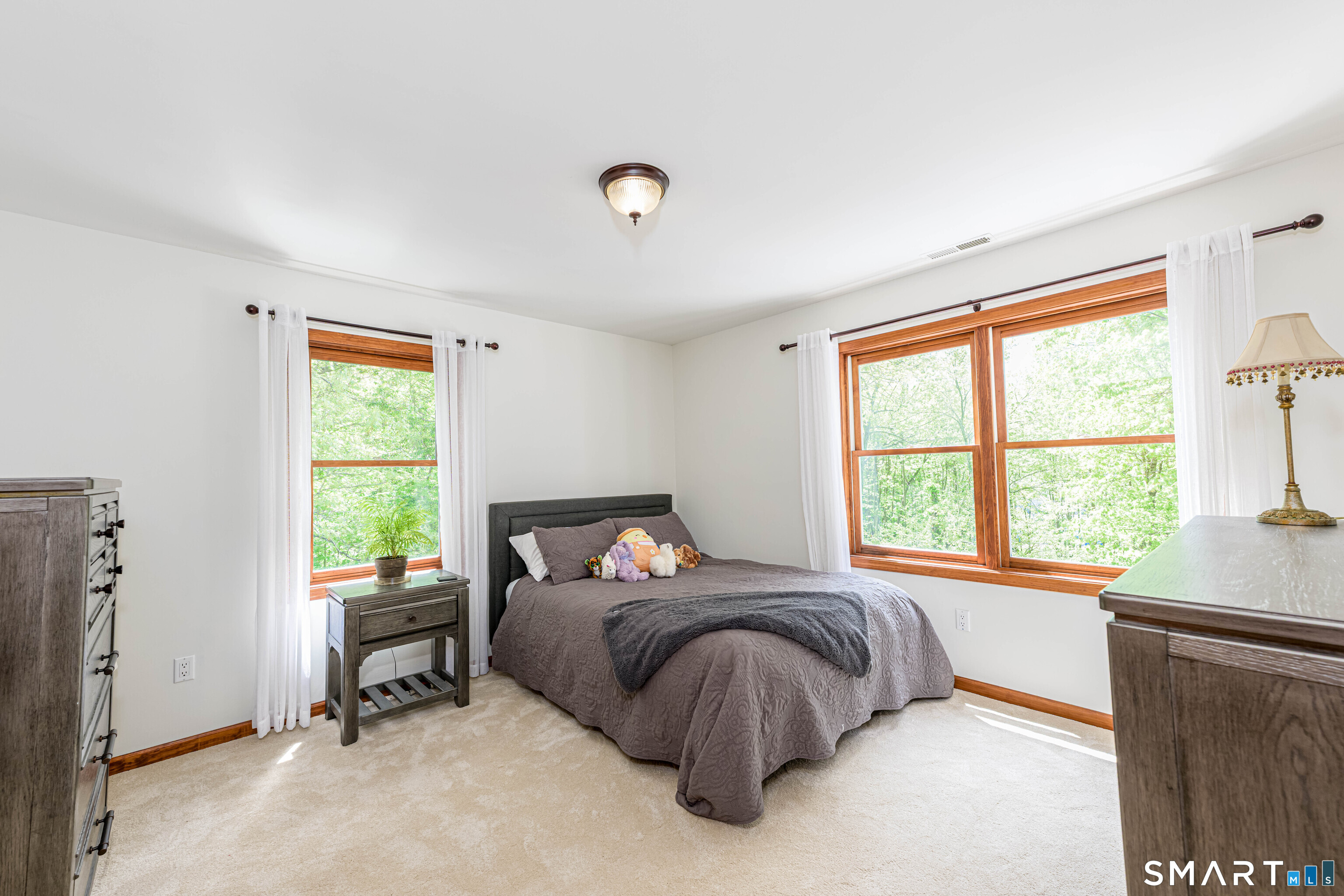 4 Crystal Lane Wallingford, CT 06492 - Photo 25 of 40 a bedroom with a bed and a window