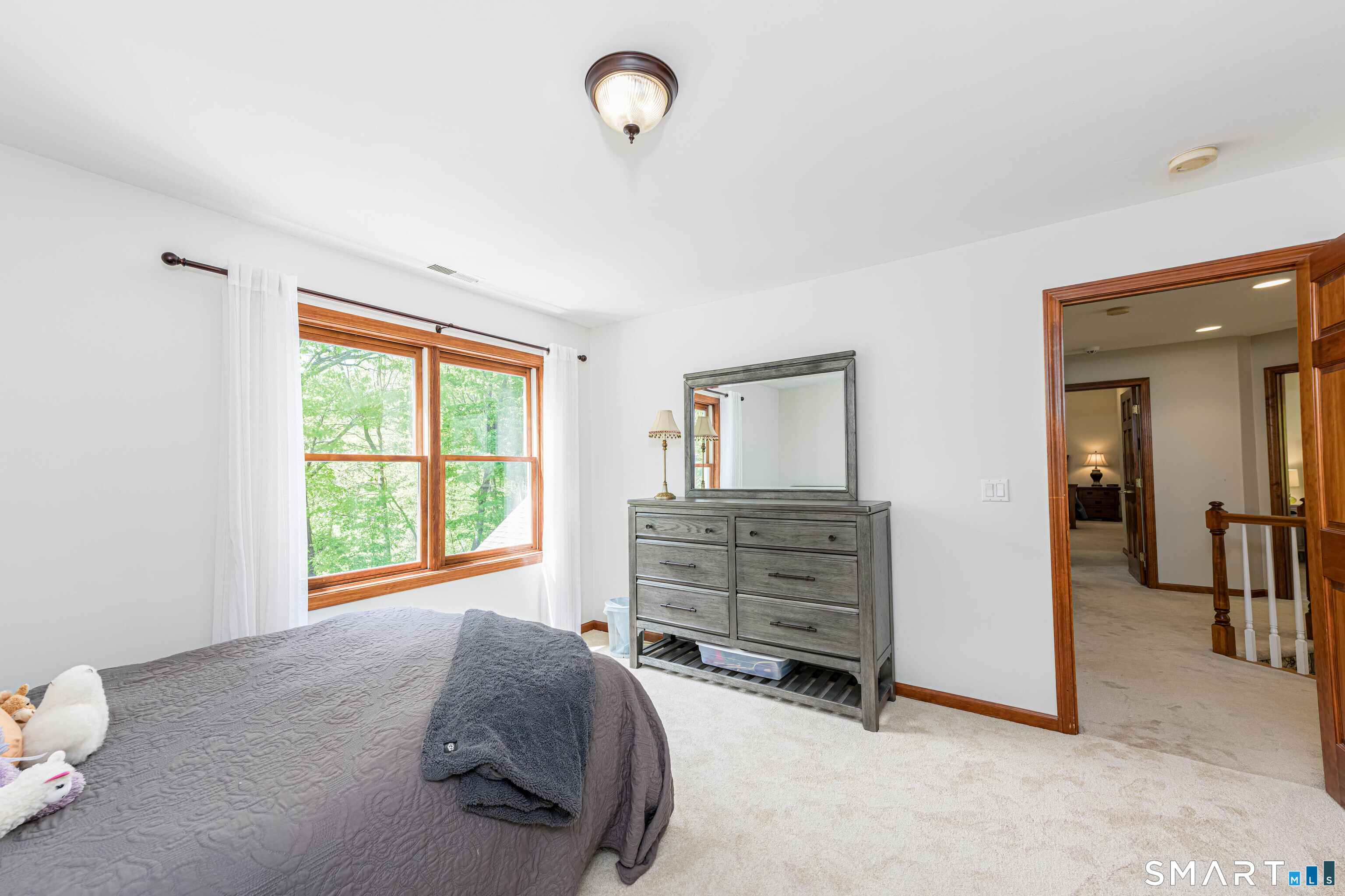 4 Crystal Lane Wallingford, CT 06492 - Photo 26 of 40 a bedroom with furniture and a window