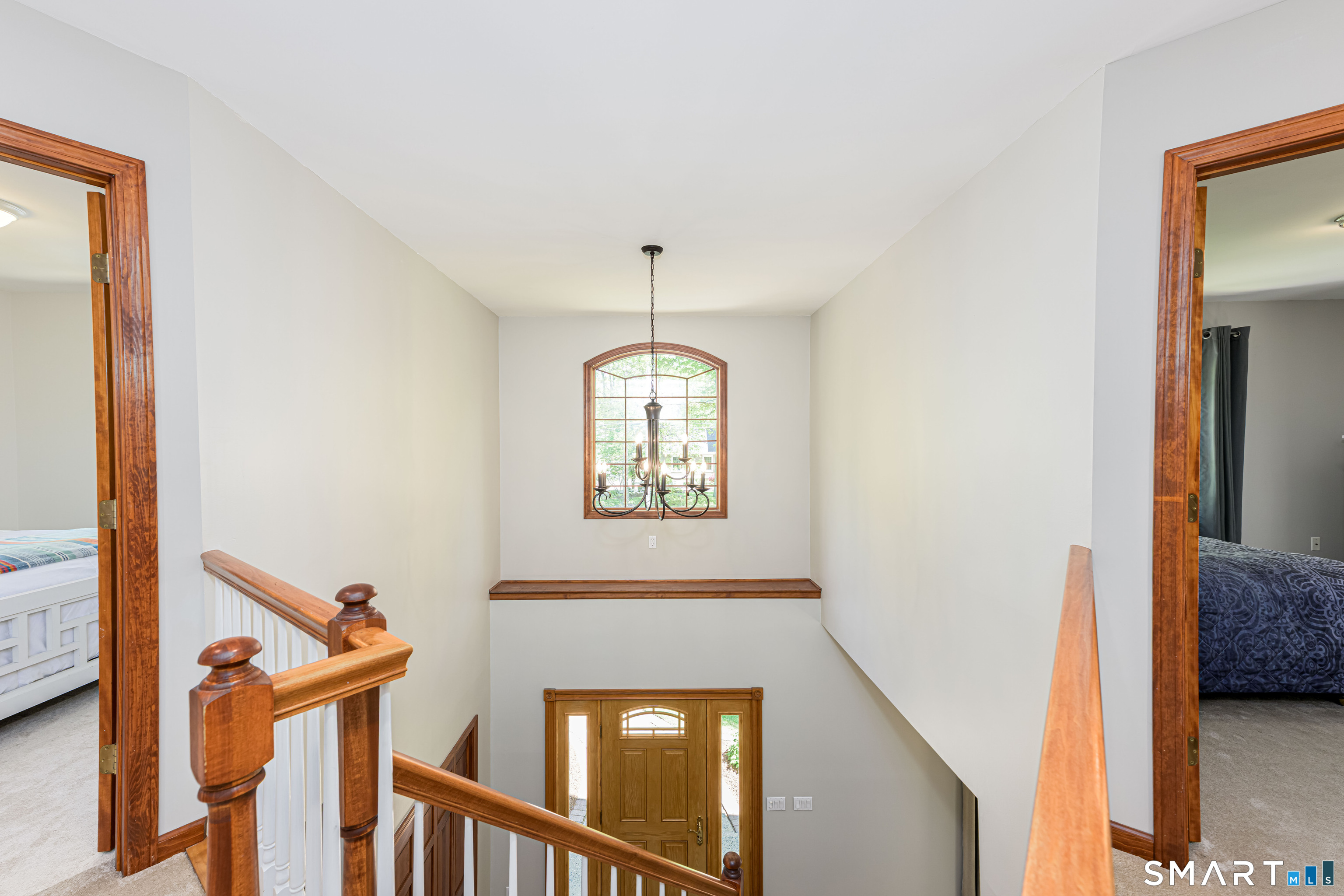 4 Crystal Lane Wallingford, CT 06492 - Photo 29 of 40 a view of a hallway with windows