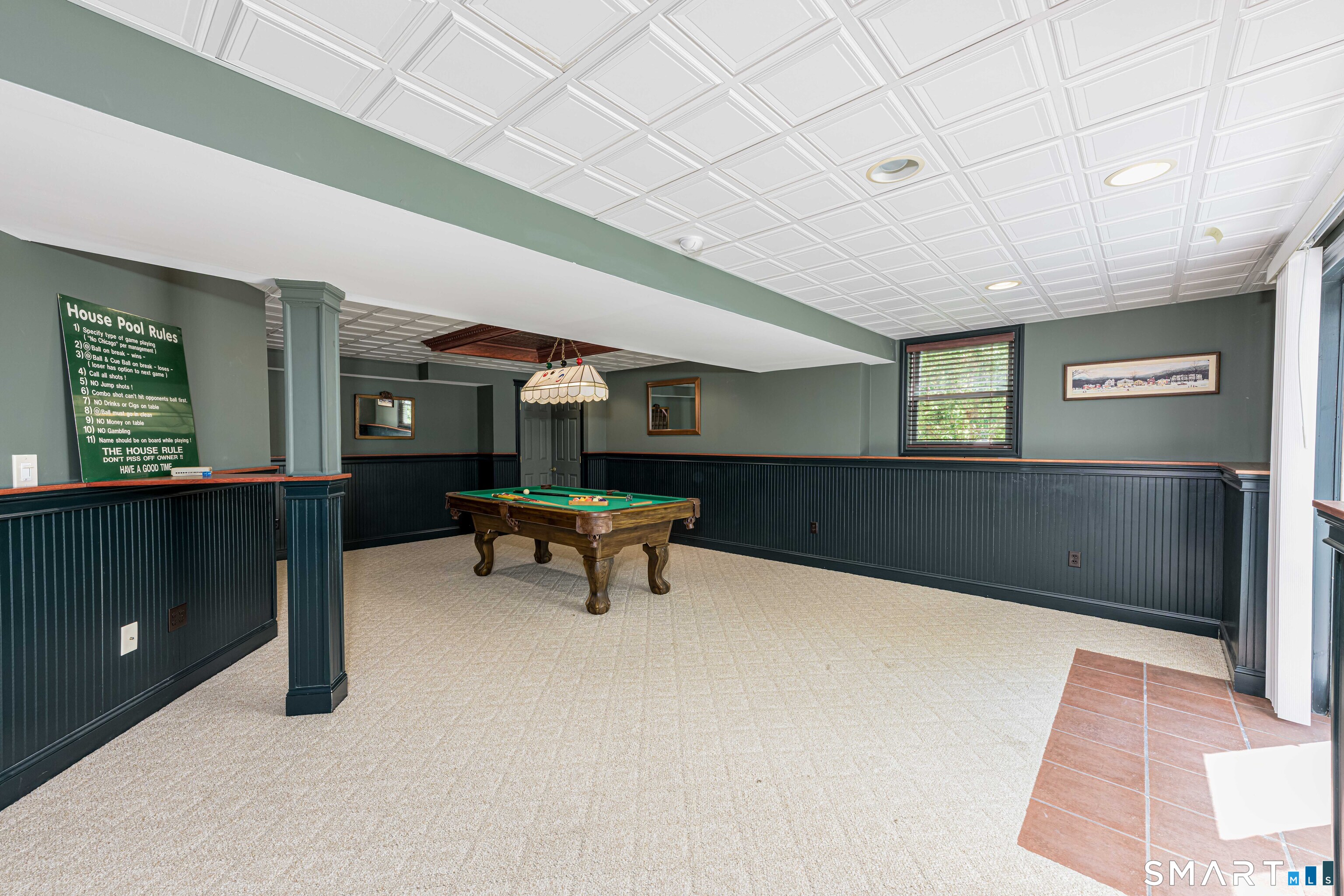 4 Crystal Lane Wallingford, CT 06492 - Photo 30 of 40 a view of game room with windows