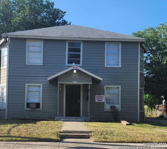 403 Terrell Avenue, Unit 3 San Antonio, TX 78214 - Photo 1 of 14 a front view of a house with garden