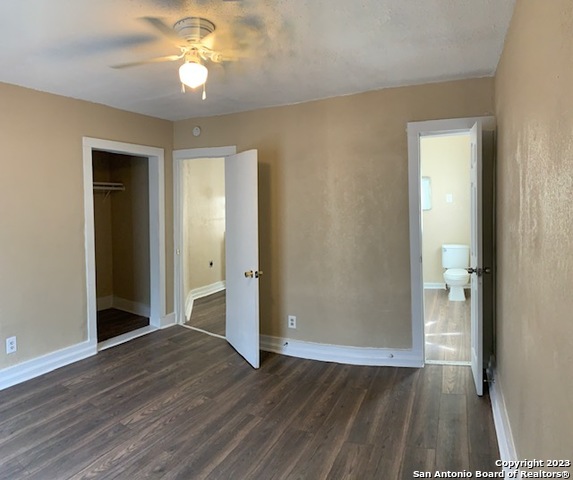 403 Terrell Avenue, Unit 3 San Antonio, TX 78214 - Photo 9 of 14 wooden floor in an empty room with a window