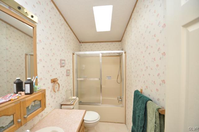 406 Levis Road Nazareth, PA 18064 - Photo 12 of 21 a bathroom with a granite countertop sink toilet and shower