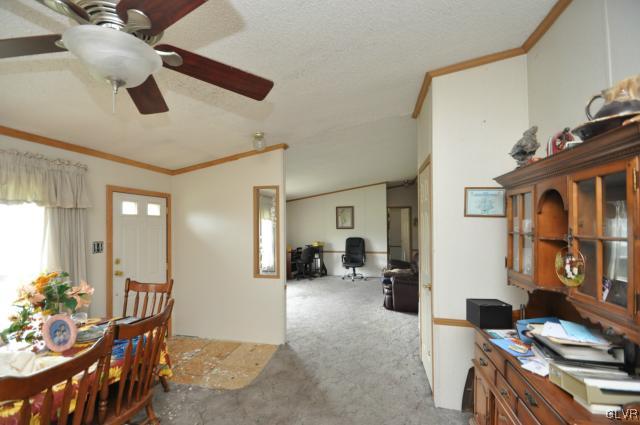406 Levis Road Nazareth, PA 18064 - Photo 4 of 21 a view of a livingroom with furniture and windows