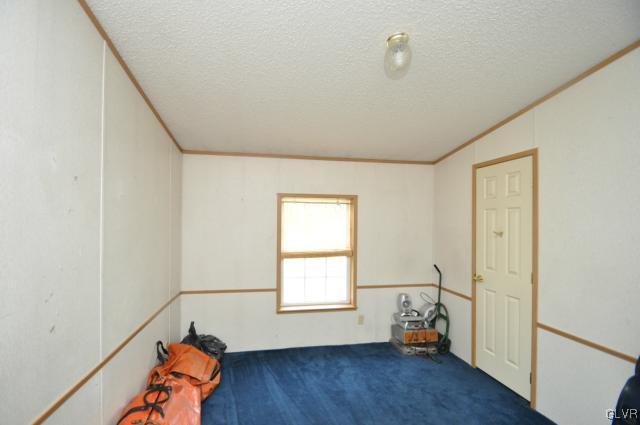 406 Levis Road Nazareth, PA 18064 - Photo 9 of 21 a room with wooden floor and a window