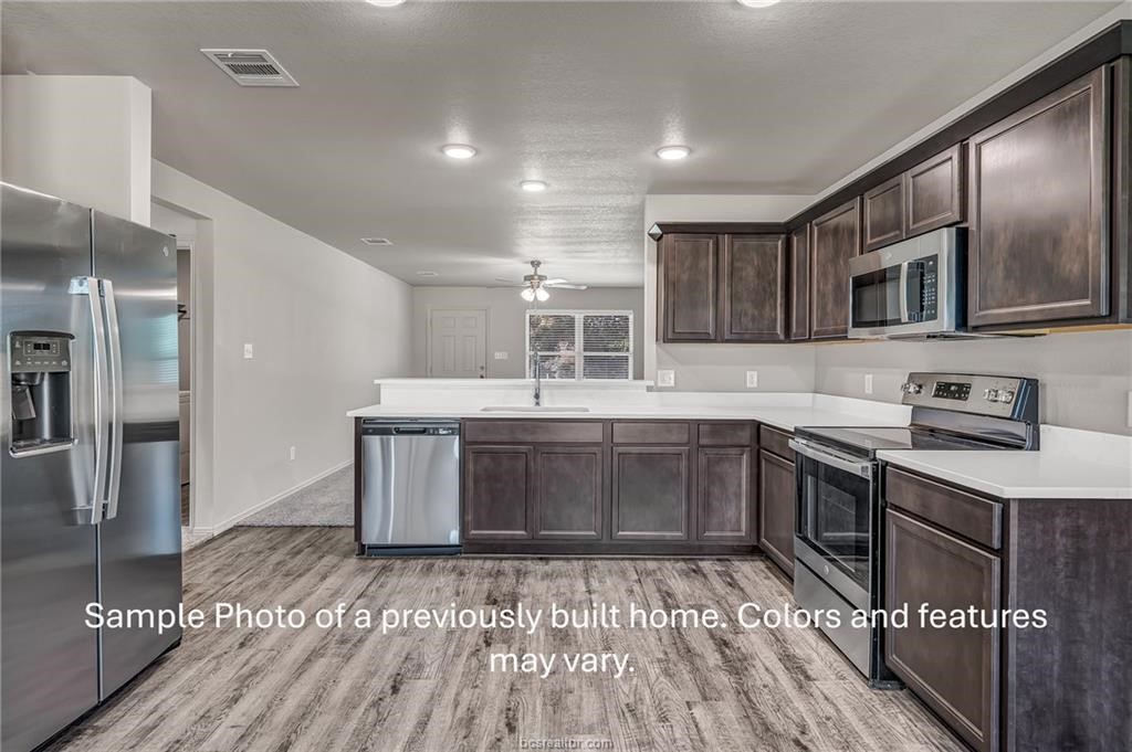 1629 Lucky Street Bryan, TX 77803 - Photo 6 of 12 **Photos are sample photos of similar plan. Colors and features might vary** Fridge not included.