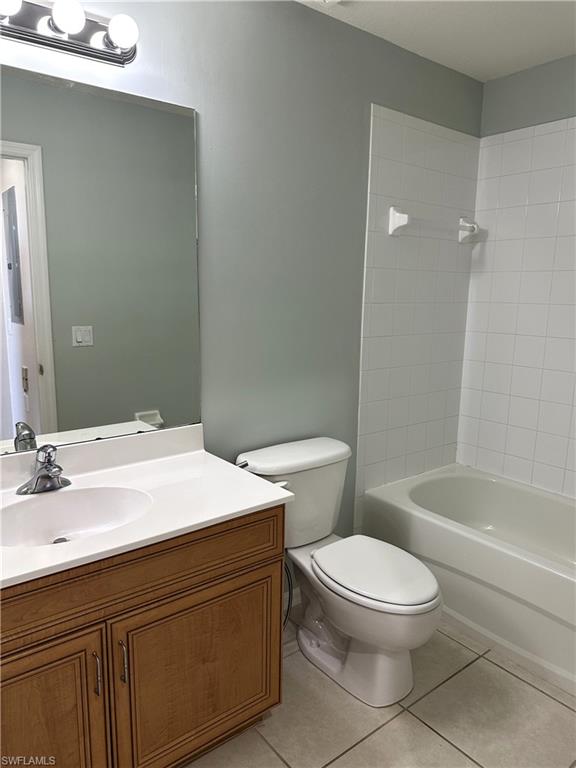 8490 Kingbird Loop, Unit 934 Estero, FL 33967 - Photo 24 of 33 a bathroom with a sink a toilet a mirror and bathtub