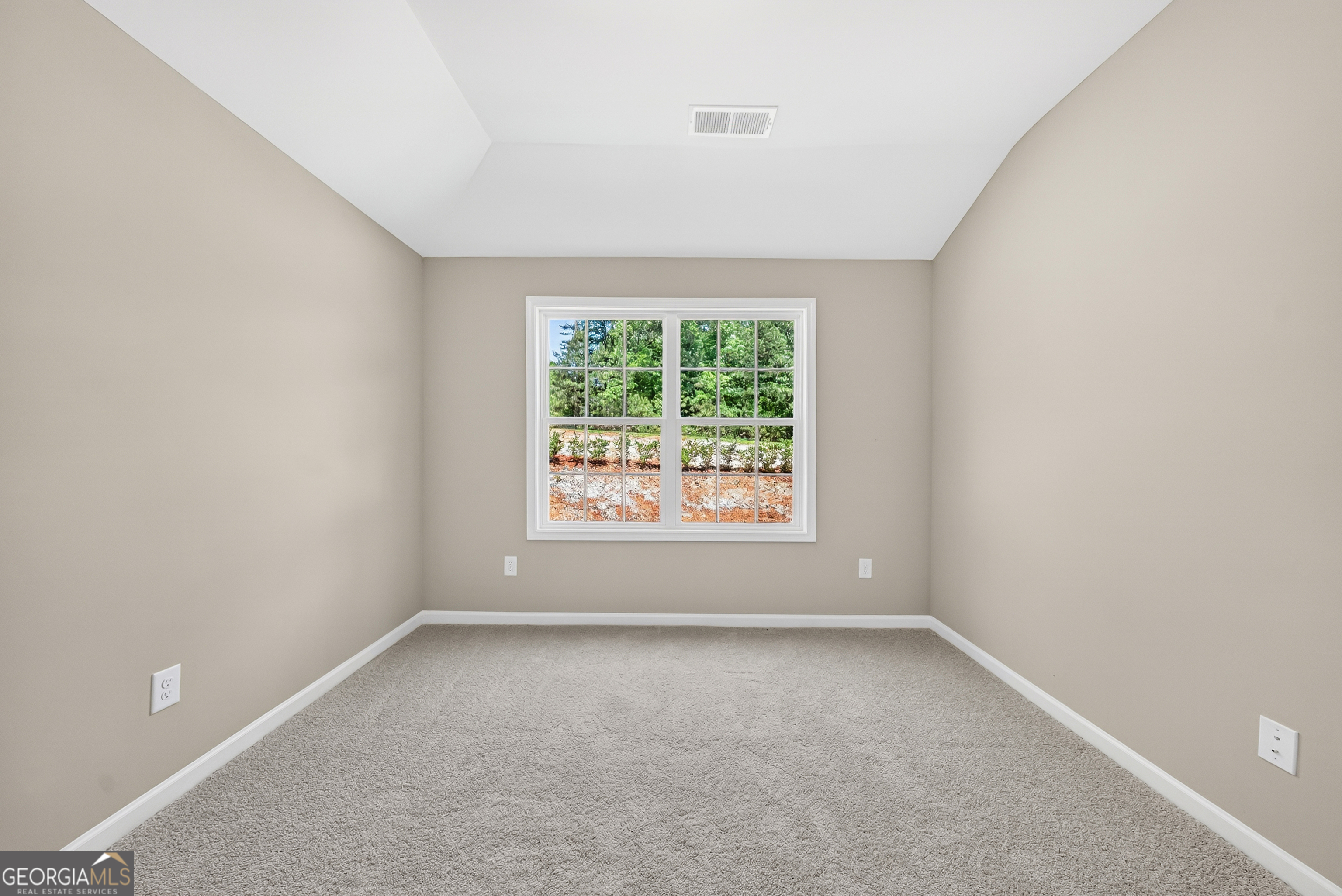 38 Oak Ridge Drive, Unit 26 Waverly Hall, GA 31831 - Photo 32 of 37 an empty room with windows