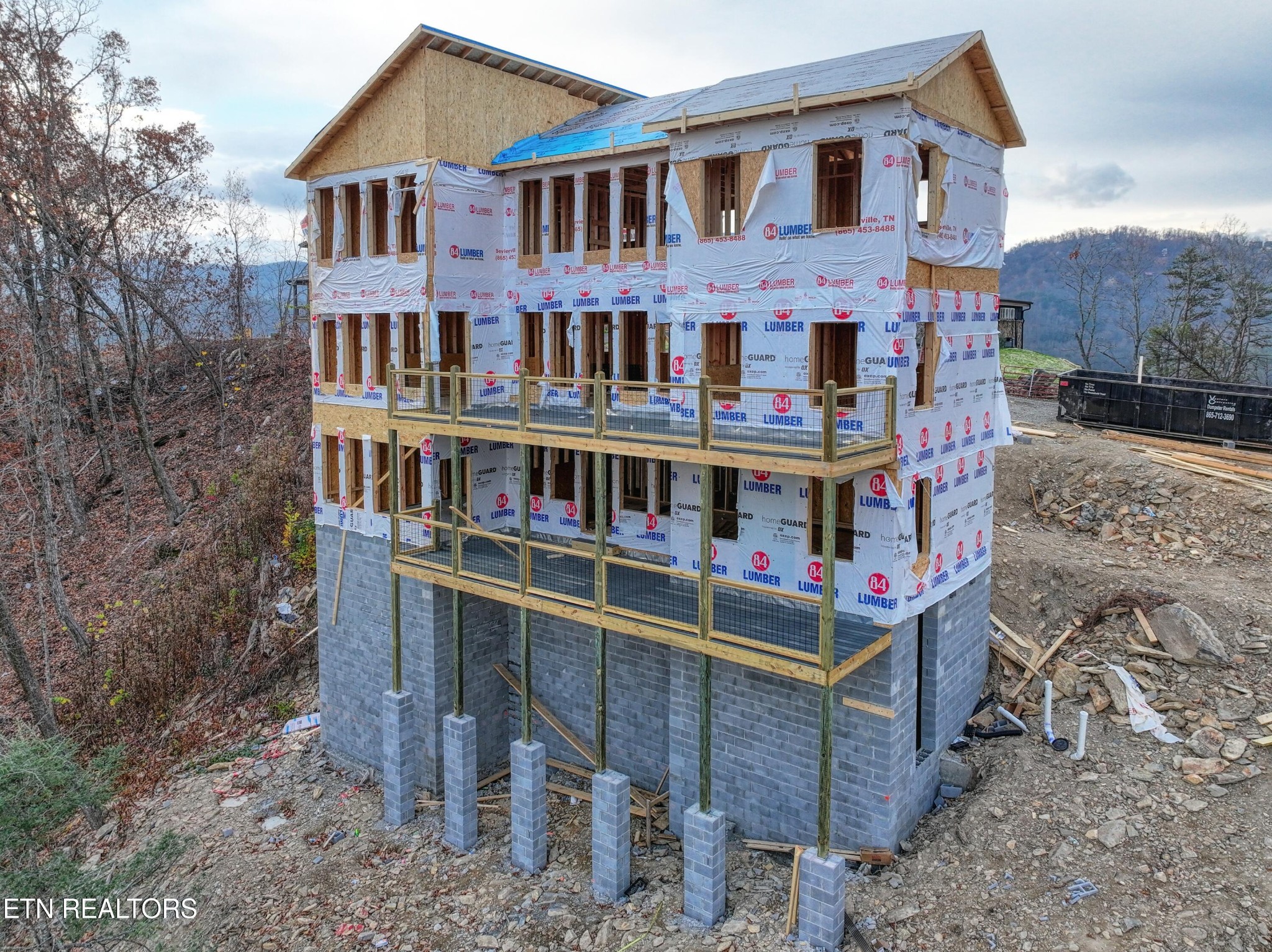 2670 Cloud View Drive Sevierville, TN 37862 - Photo 4 of 47 a front view of a residential apartment building with a yard