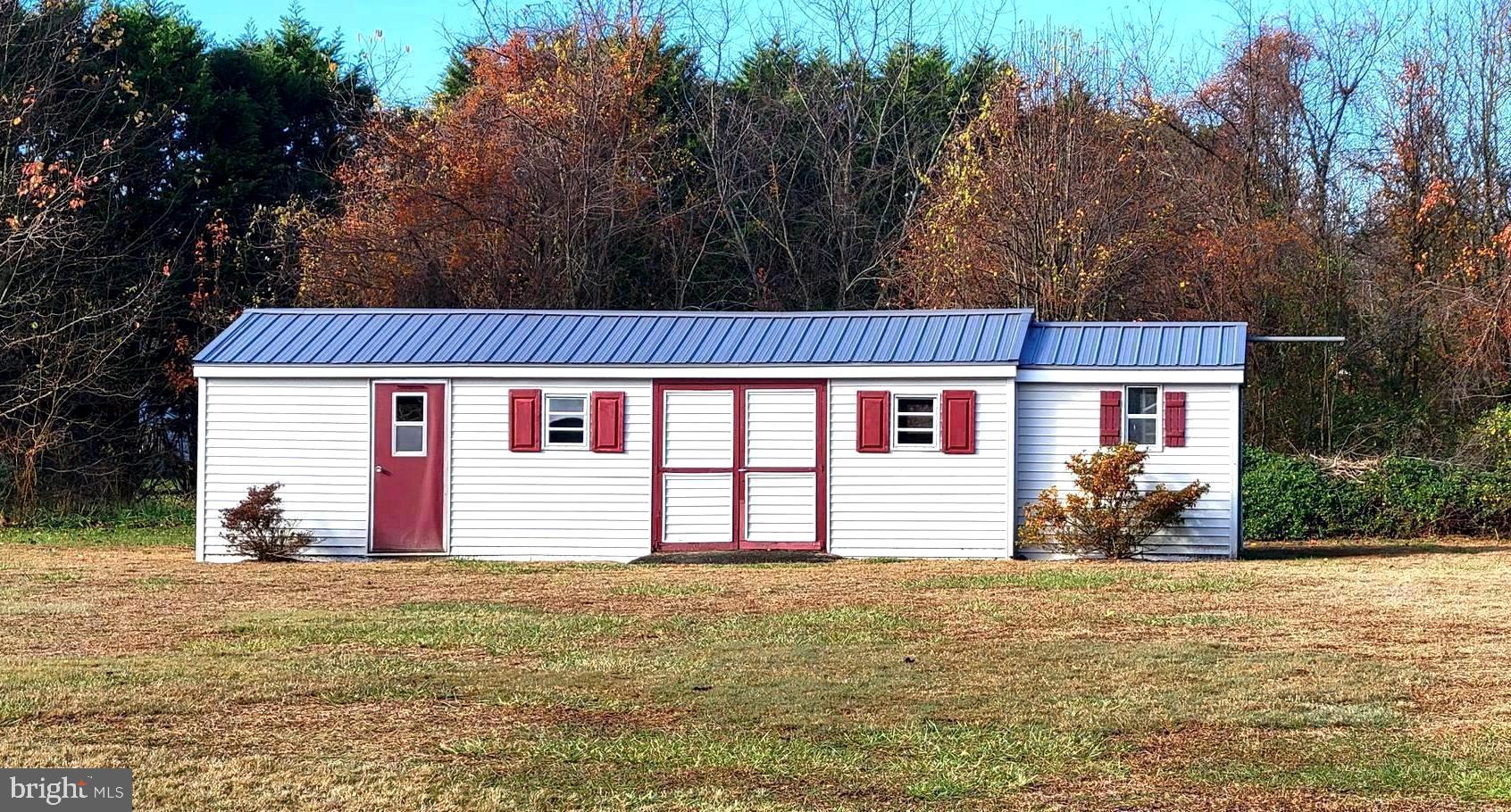 24644 Peterkins Road Georgetown, DE 19947 - Photo 60 of 66 Shed/ Workshop Located in Back Yard