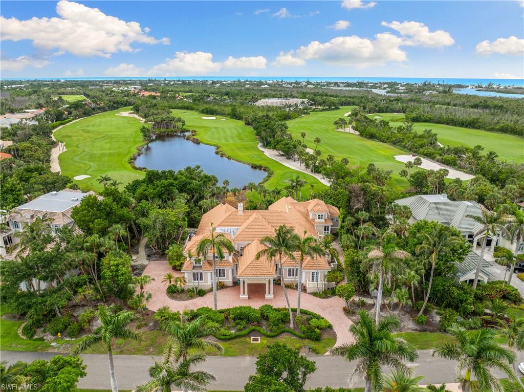 an aerial view of lake residential houses with outdoor space and street view