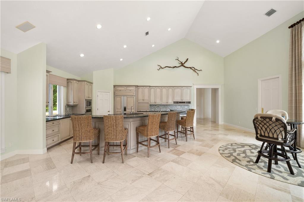 2969 Wulfert Road Sanibel, FL 33957 - Photo 13 of 44 a view of a dining room with furniture