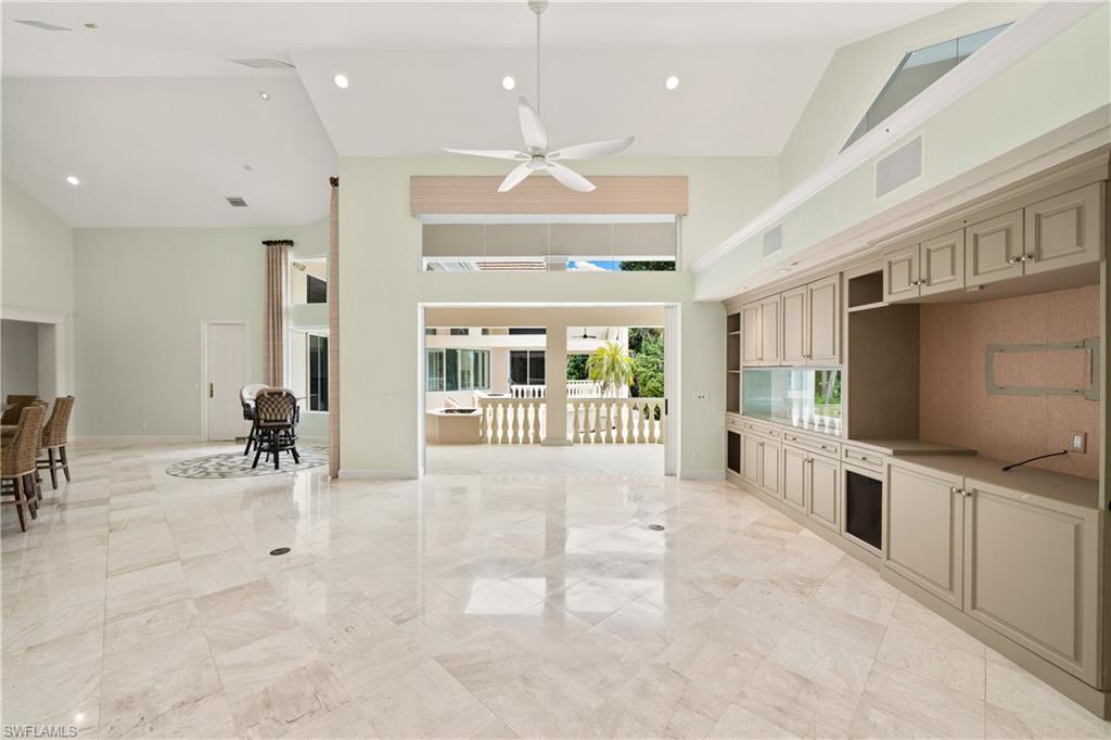 2969 Wulfert Road Sanibel, FL 33957 - Photo 17 of 44 a view of a livingroom with a flat screen tv
