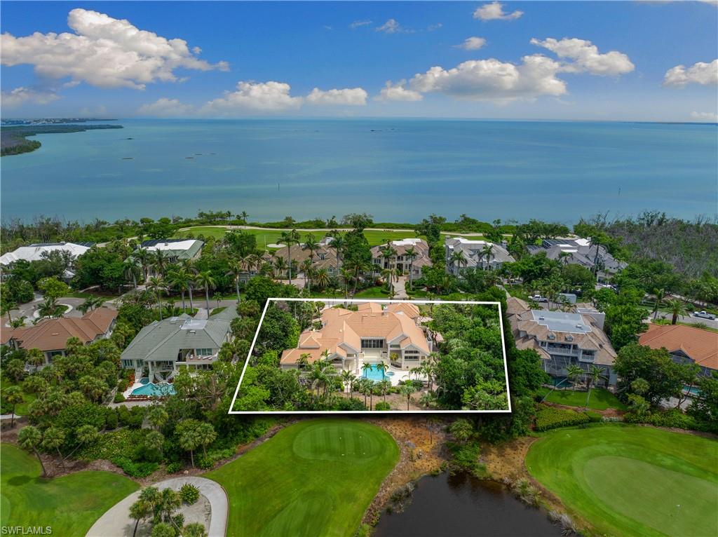2969 Wulfert Road Sanibel, FL 33957 - Photo 2 of 44 an aerial view of multiple house