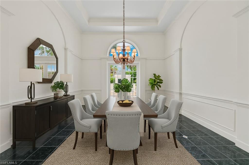 2969 Wulfert Road Sanibel, FL 33957 - Photo 24 of 44 a dining room with furniture and window
