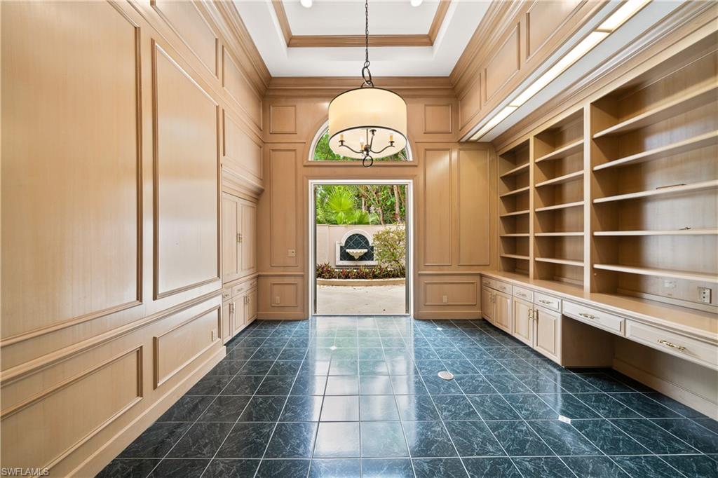 2969 Wulfert Road Sanibel, FL 33957 - Photo 25 of 44 a view of a hallway with windows