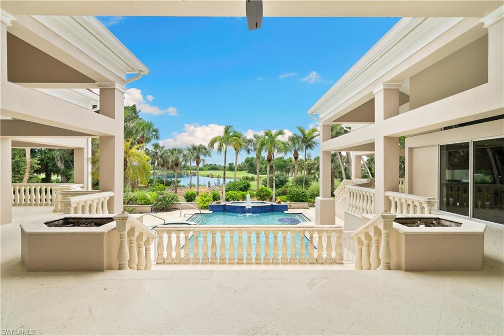 2969 Wulfert Road Sanibel, FL 33957 - Photo 7 of 44 a view of a patio with couches table and chairs and potted plants