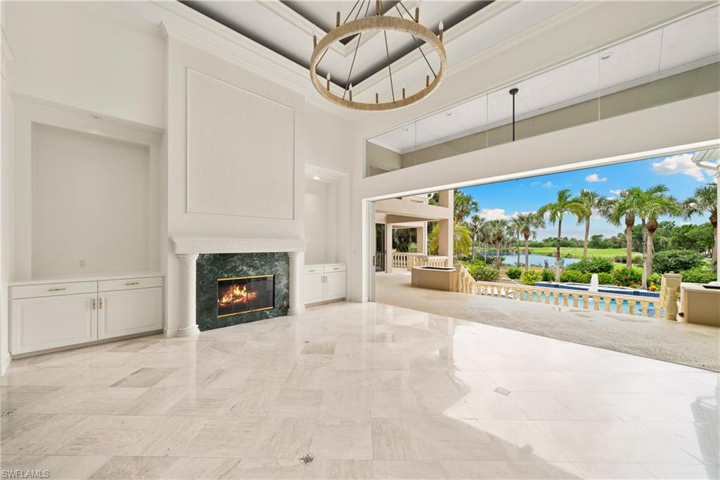 2969 Wulfert Road Sanibel, FL 33957 - Photo 8 of 44 a view of a fireplace and window in the room