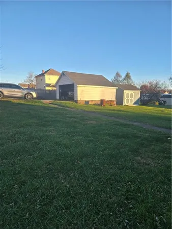 a view of a big yard next to a yard