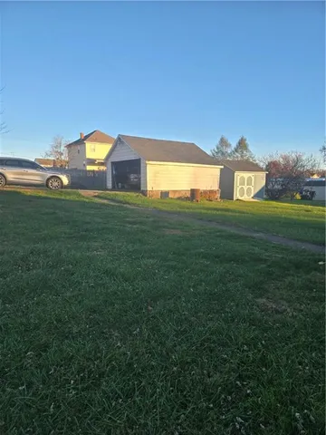 a view of a big yard next to a yard