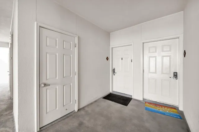 a view of balcony with furniture