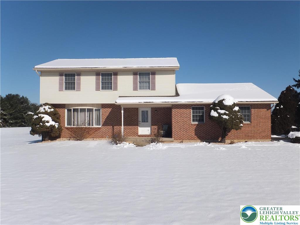 1207 Kressler Road Allentown, PA 18103 - Photo 1 of 27 a front view of a house with a yard