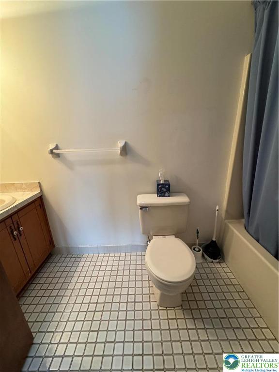 1207 Kressler Road Allentown, PA 18103 - Photo 13 of 27 a bathroom with a toilet and a shower