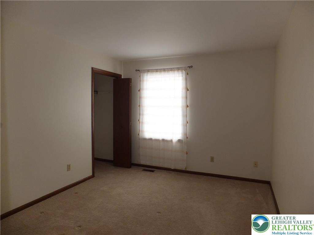 1207 Kressler Road Allentown, PA 18103 - Photo 14 of 27 an empty room with a window